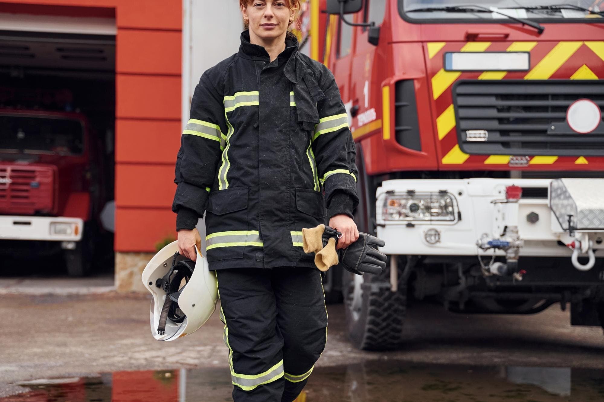 Firefighter communicating over a two-way radio during an emergency response